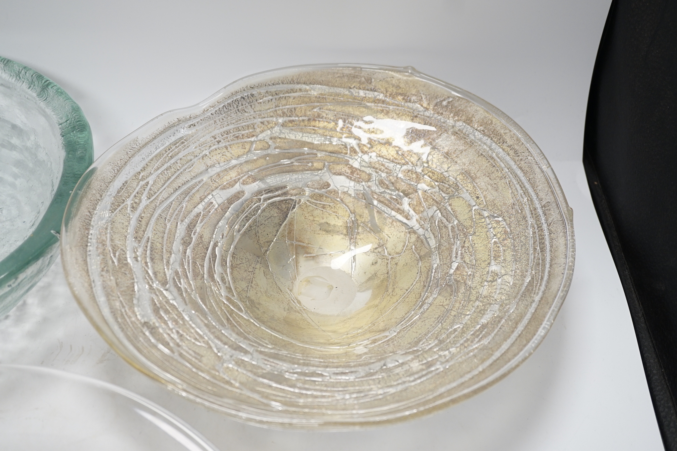 Three glass dishes, including one by Orrefors and one by A A Designs, largest 35cm in diameter